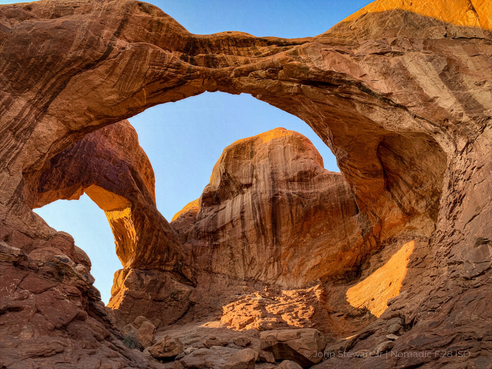 Built By What Should Have Broken It — Looking up through Double Arch, Arches National Park, Utah 2020